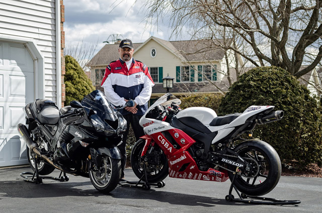 johns next to his bike