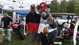 John with the Iron Pigs mascot