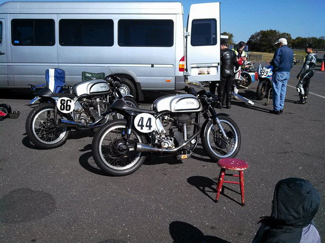 A pair of really cool old vintage race Nortons
