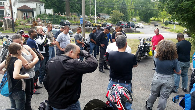 Rick sharing scripture with the riders